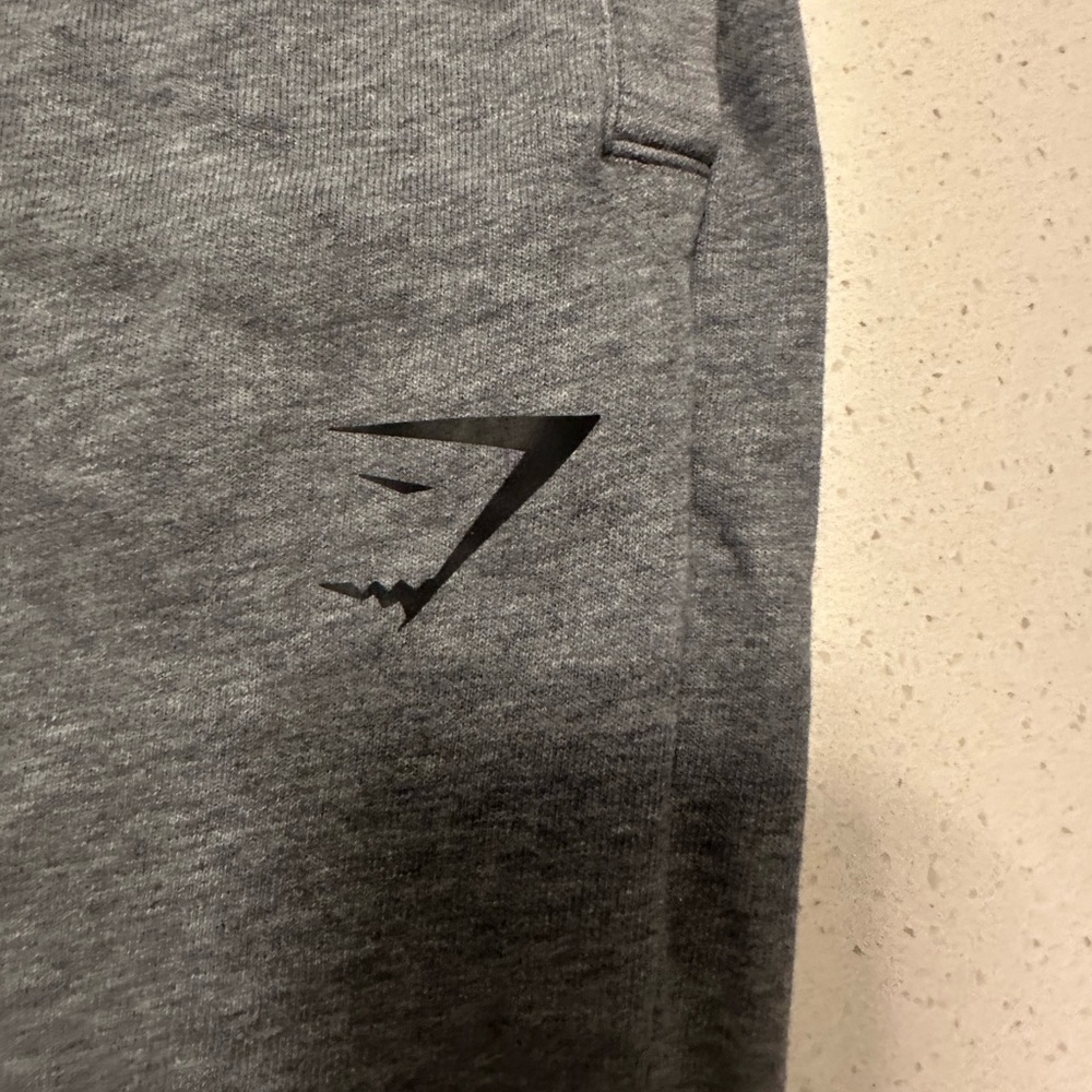 Gray men’s gymsharks Joggers with Black Logo